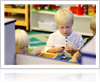 Child Playing with Lego in Pre-Kindergarten